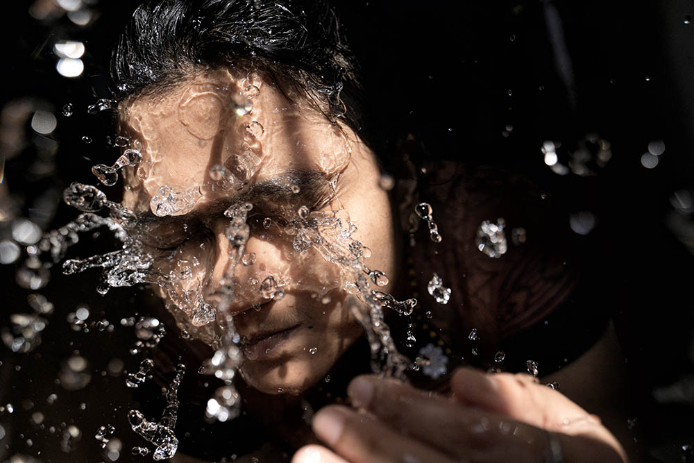 Girl washing face_Praveen kumar Mathivanan_Unsplash