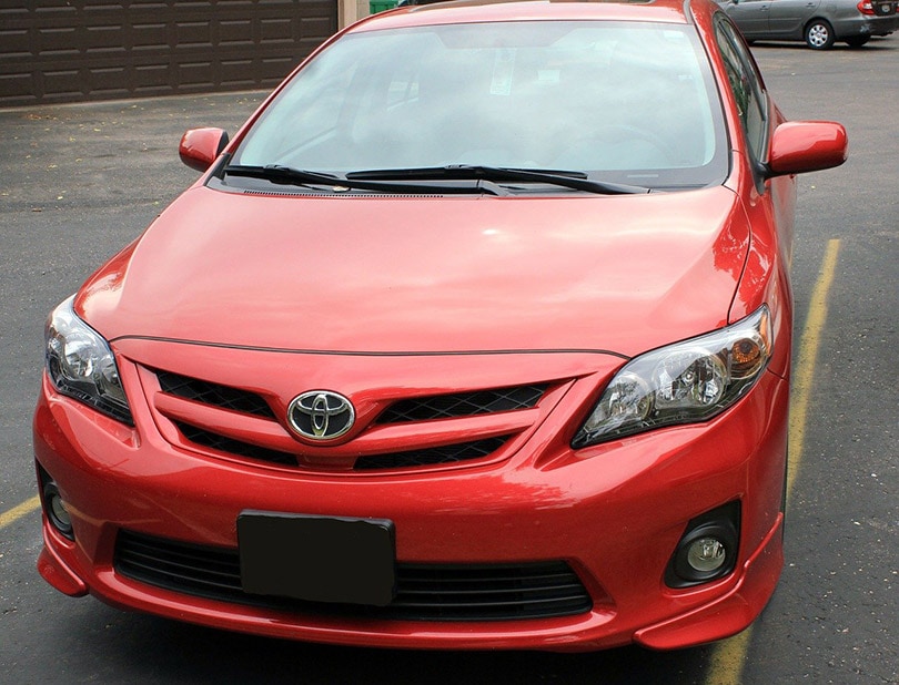 red toyota corolla car