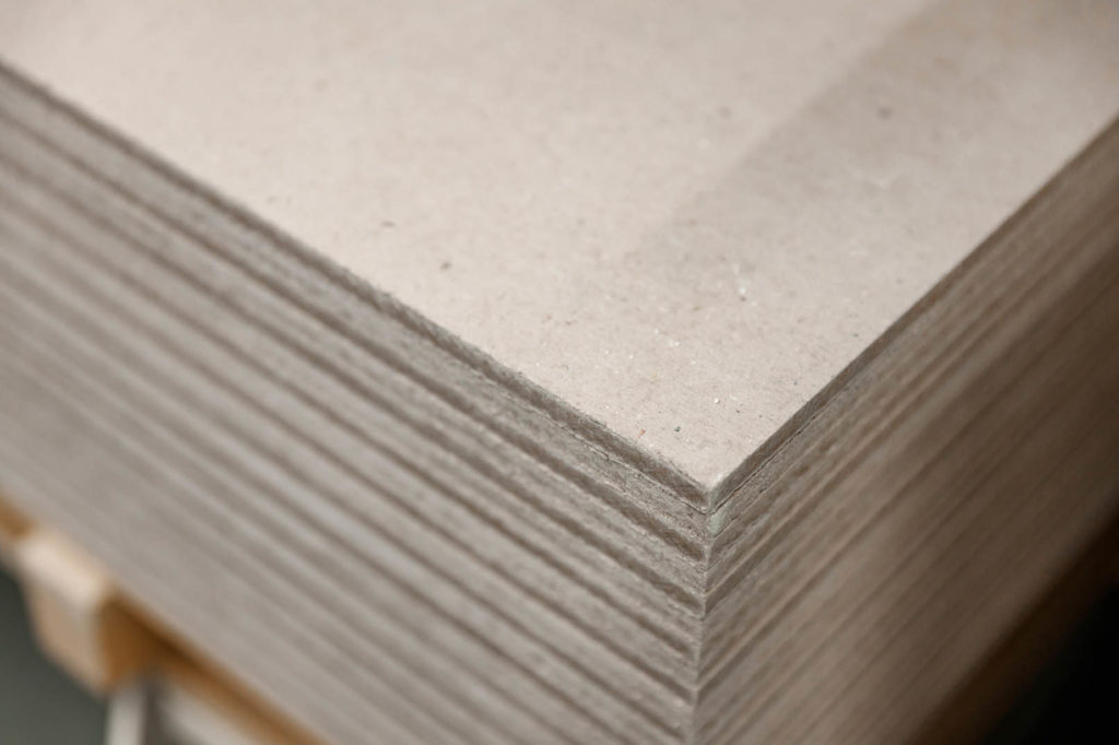 stack of moisture-resistant drywall