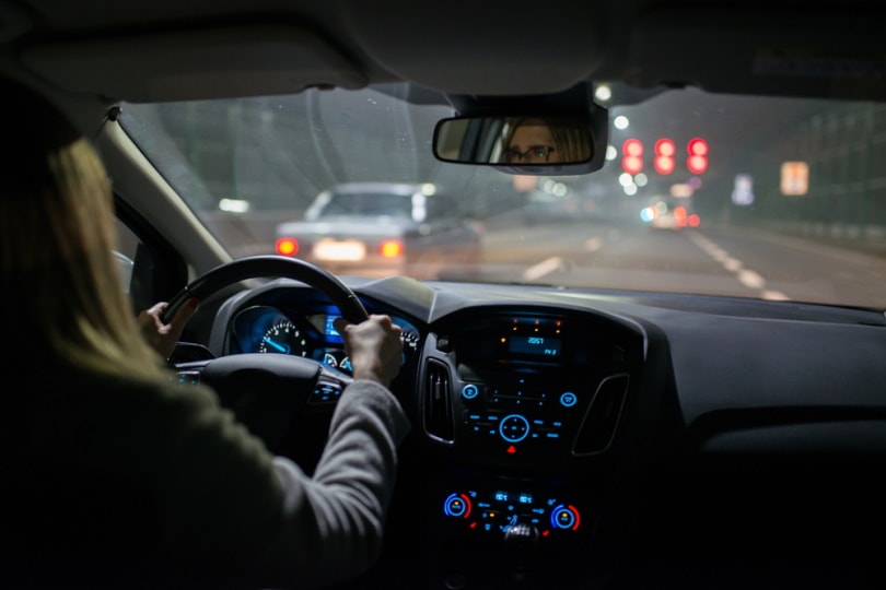 woman driving at night