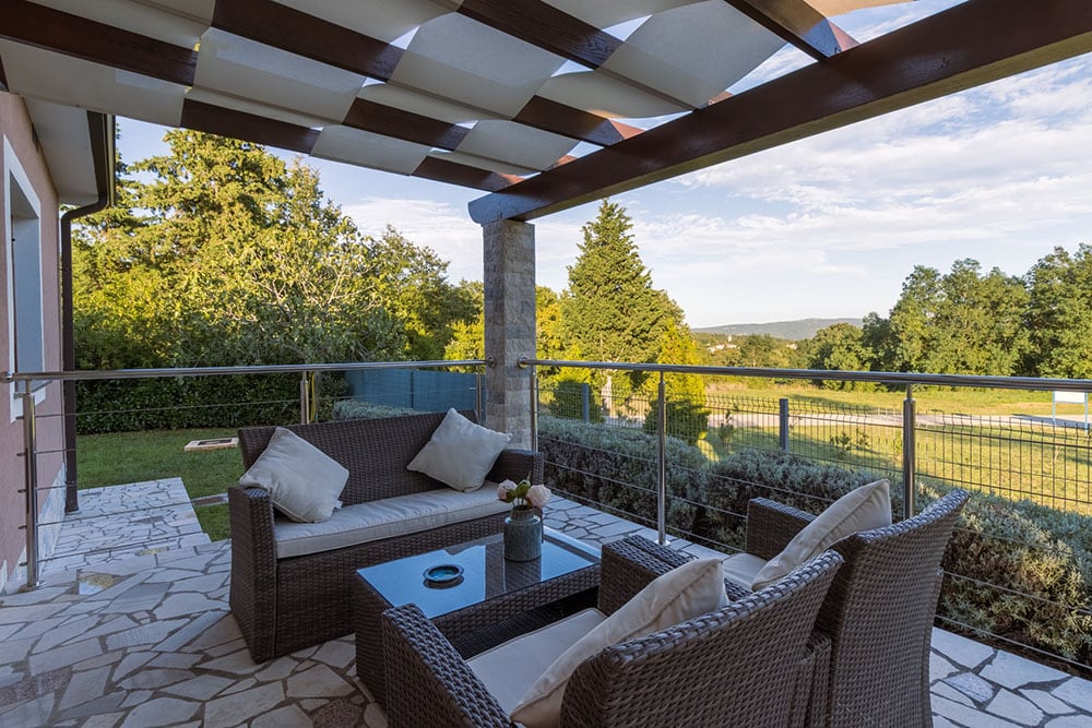 stone paved patio overlooking the city