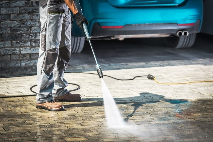 pressure washing the driveway