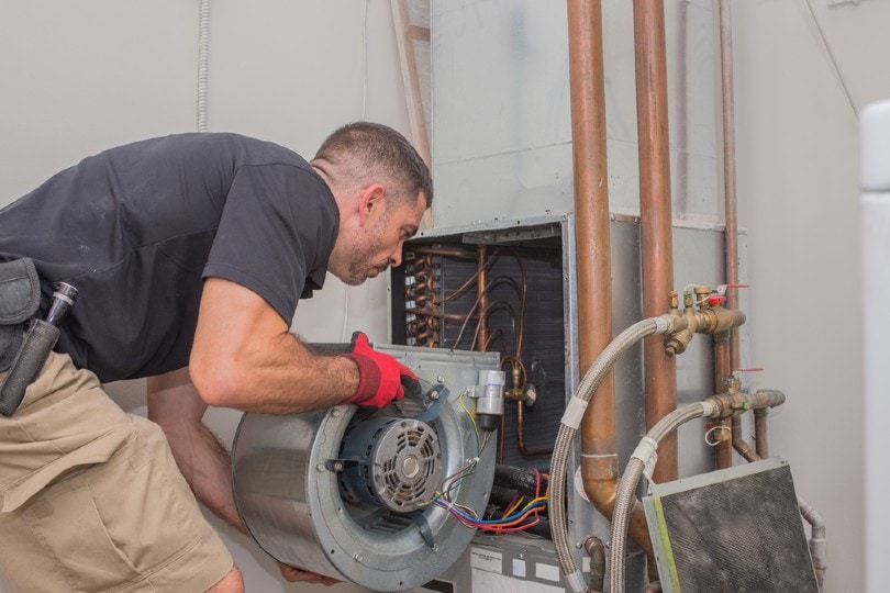 repair technician with air handler