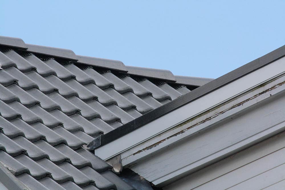 close up deck tiles and EPDM flat roof