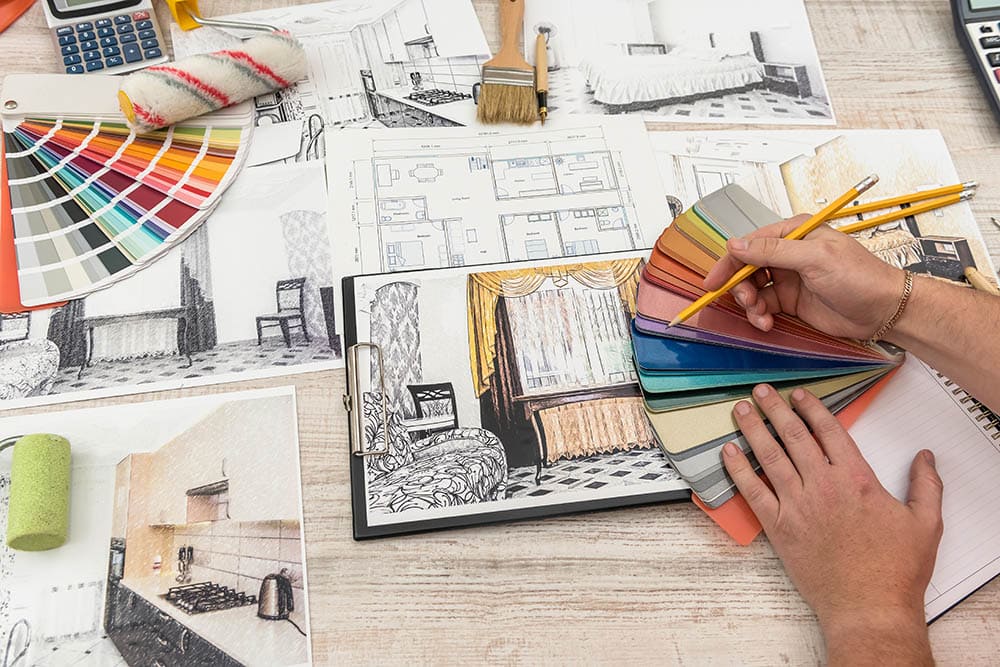 interior designer sketching designs