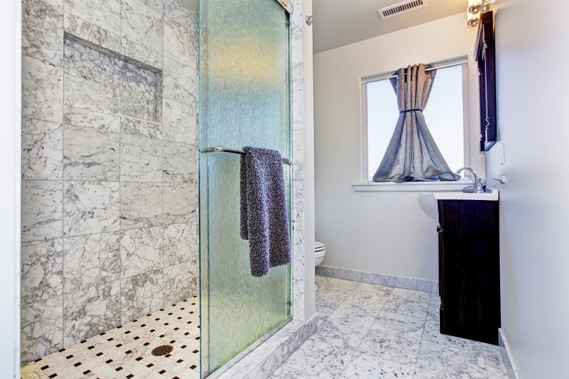 Bathroom with granite tile floor